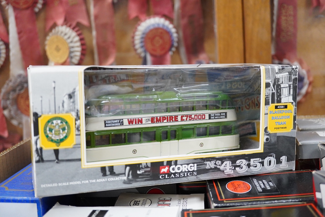 Forty-five boxed diecast trams, buses and other commercial vehicles by Corgi Classic, Corgi OOC, and EFE, operators include Leeds tram, the Tate & Lyle Story set, Blackpool Corporation Transport (seven examples), Thornyc